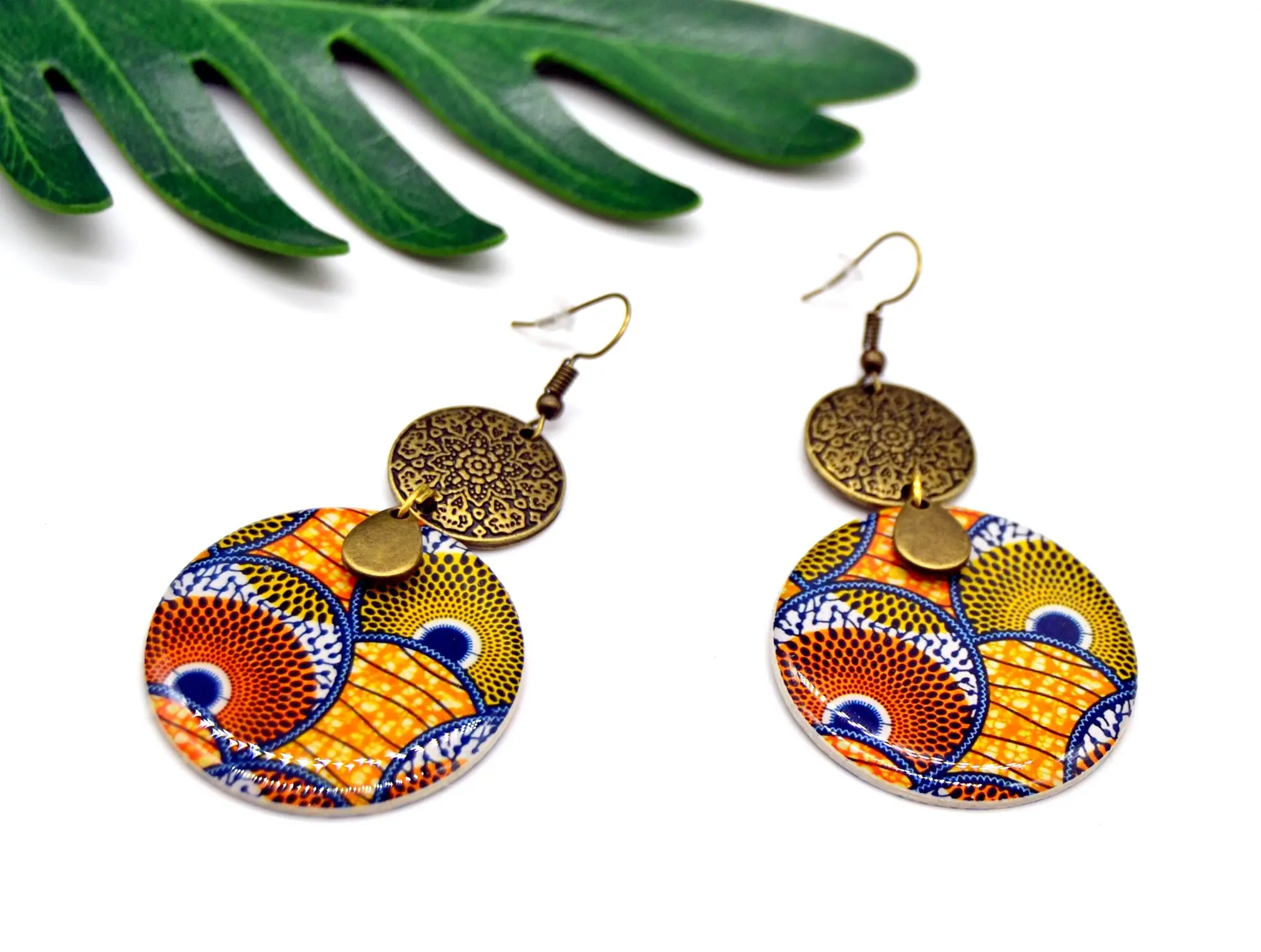 Round African wax earrings paper and orange green brown resin