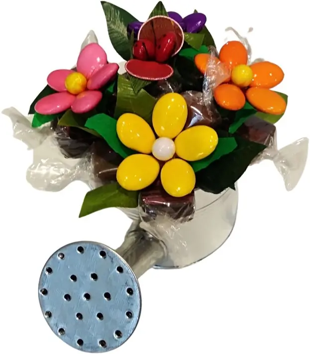 Watering can with sugared almond flowers and chocolates