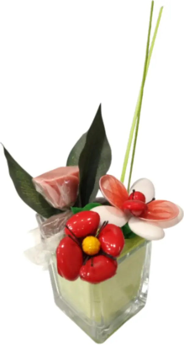 Cube with pink marzipan, sugared almonds and chocolate