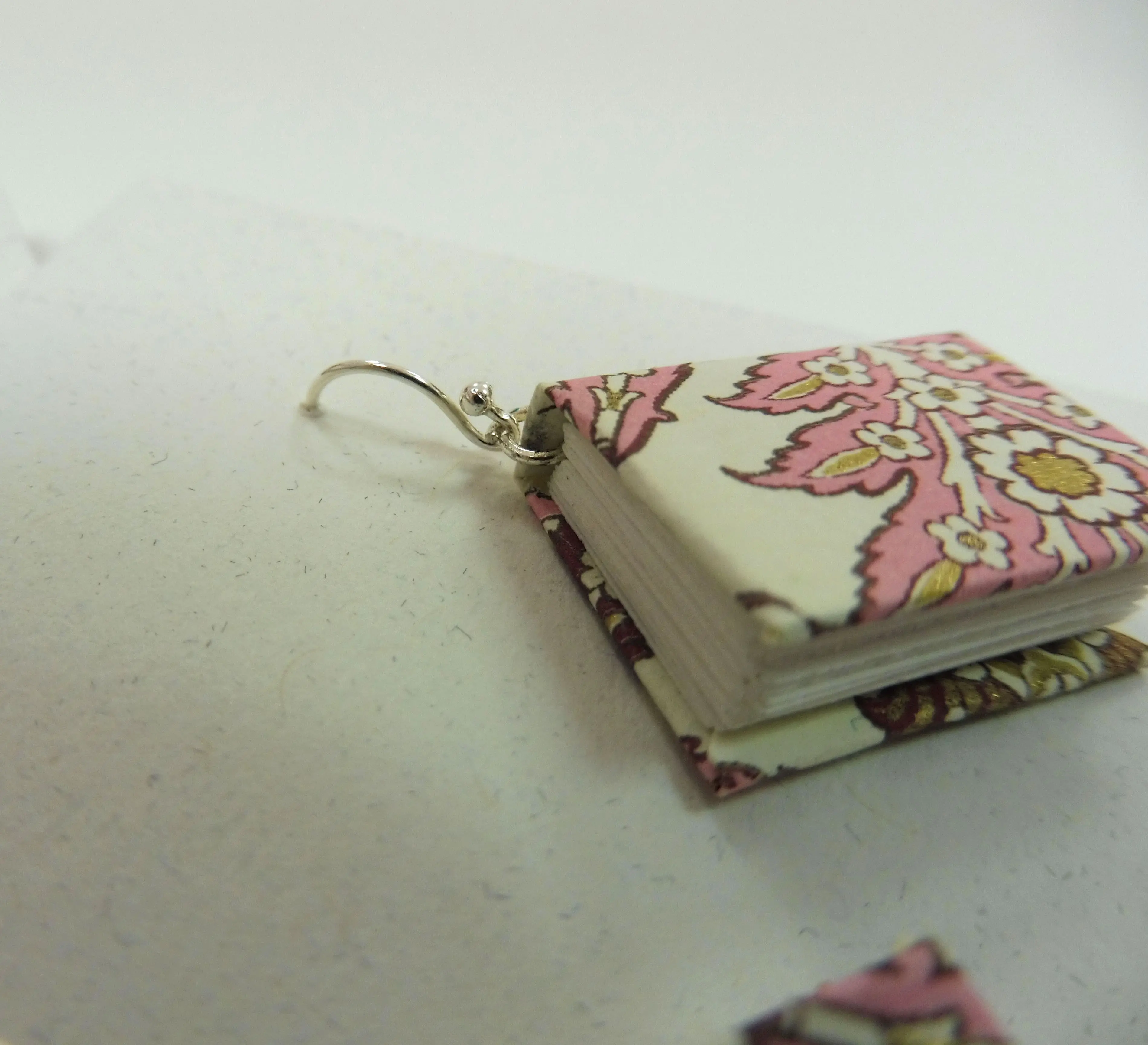 Earrings made with mini Italian paper books