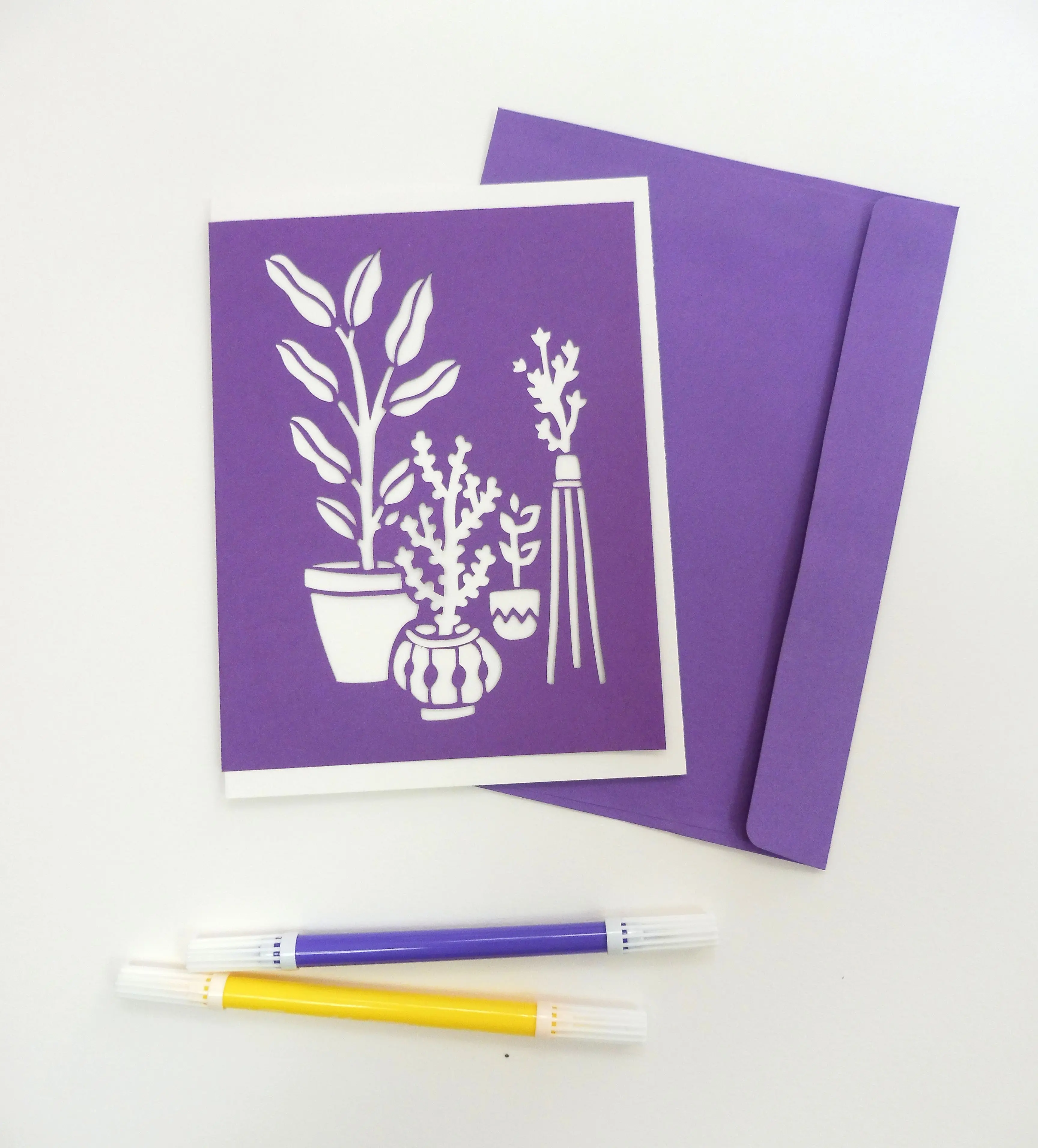 Die-cut postcard with plant design