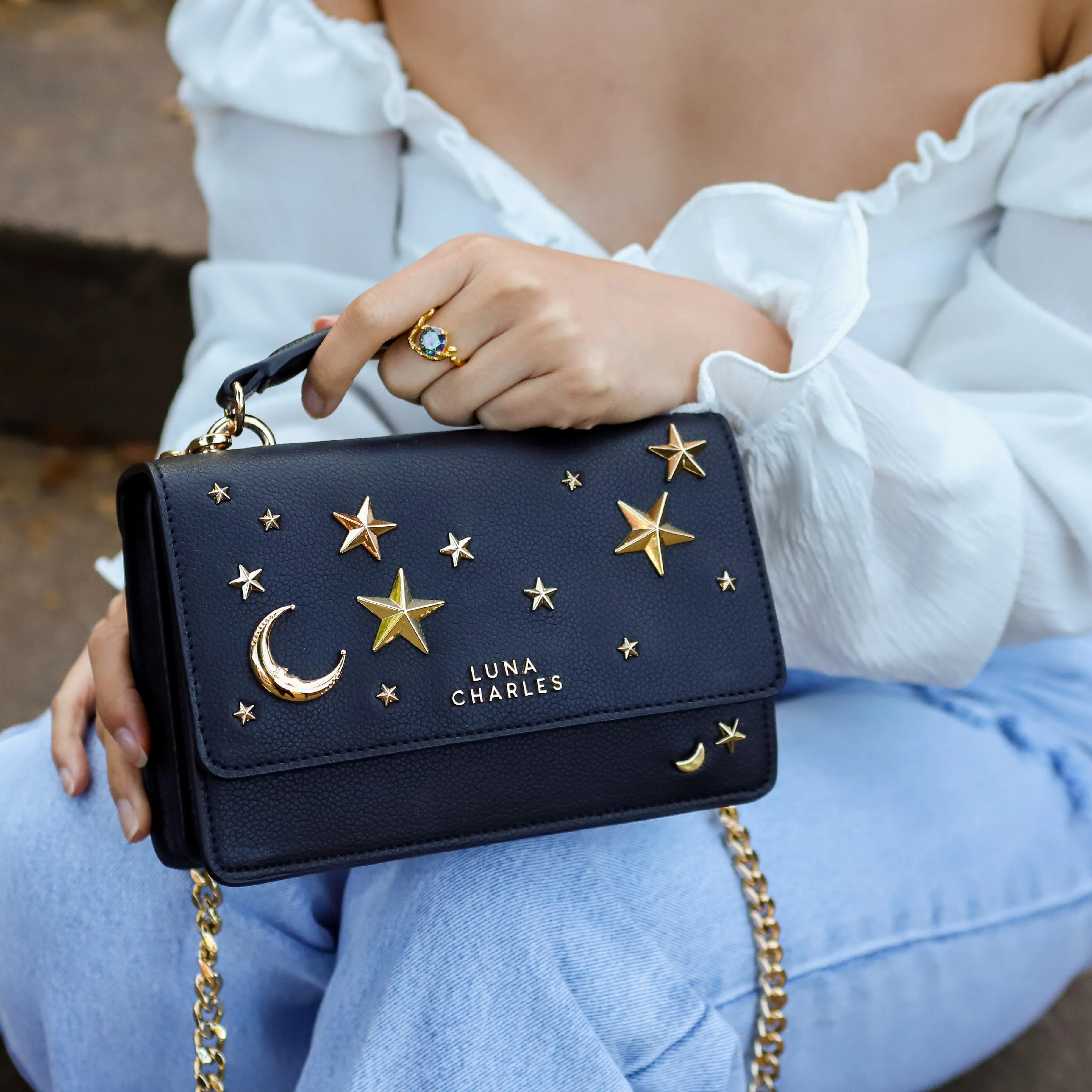 Bolso de mano con tachuelas Nova Star - Negro y dorado - Cuero vegano