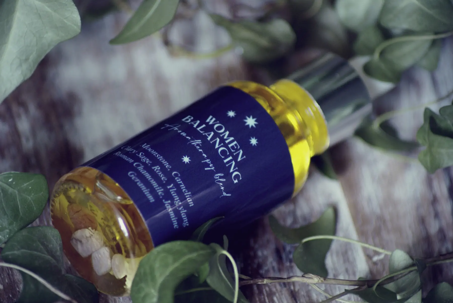 Women balancing aromatherapy pulse points oil