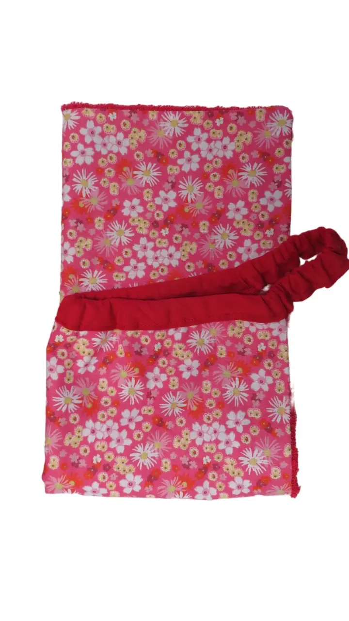 Canteen elastic bib towel yellow and white flowers on a pink background