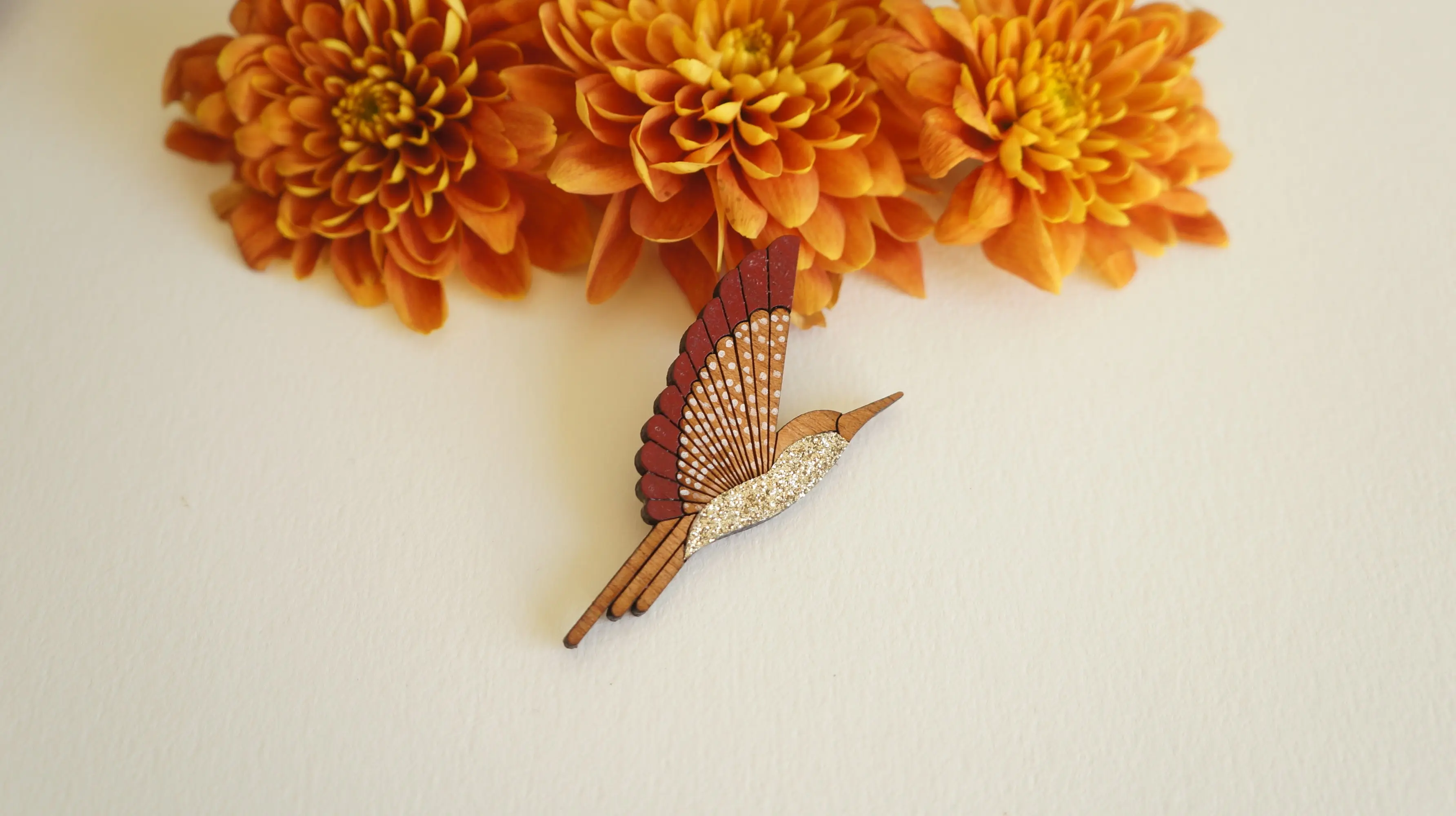 Burgundy hummingbird brooch
