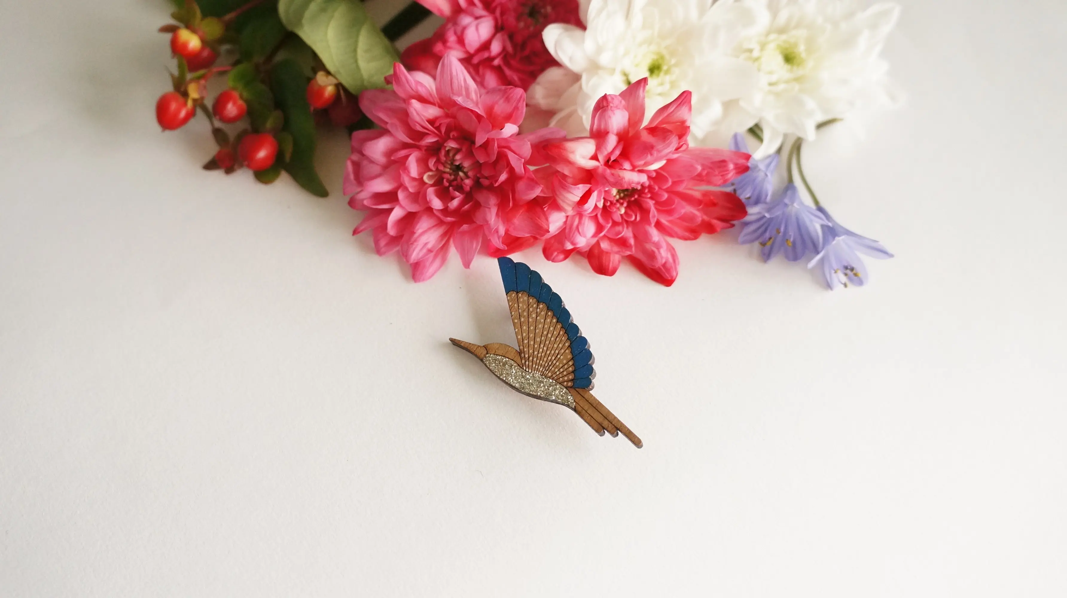 Blue hummingbird brooch