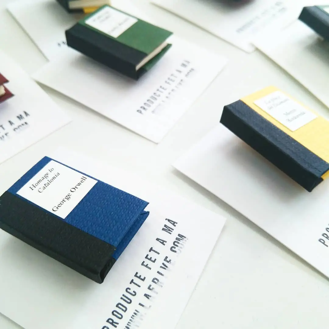 Mini book brooch with customizable classic titles