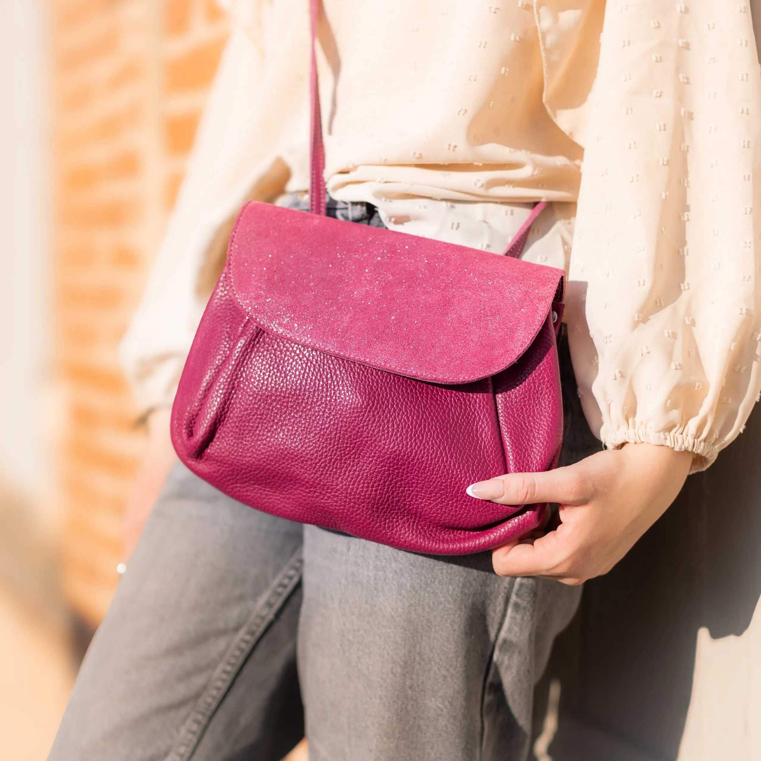 Bolso acordeón de piel con lentejuelas
