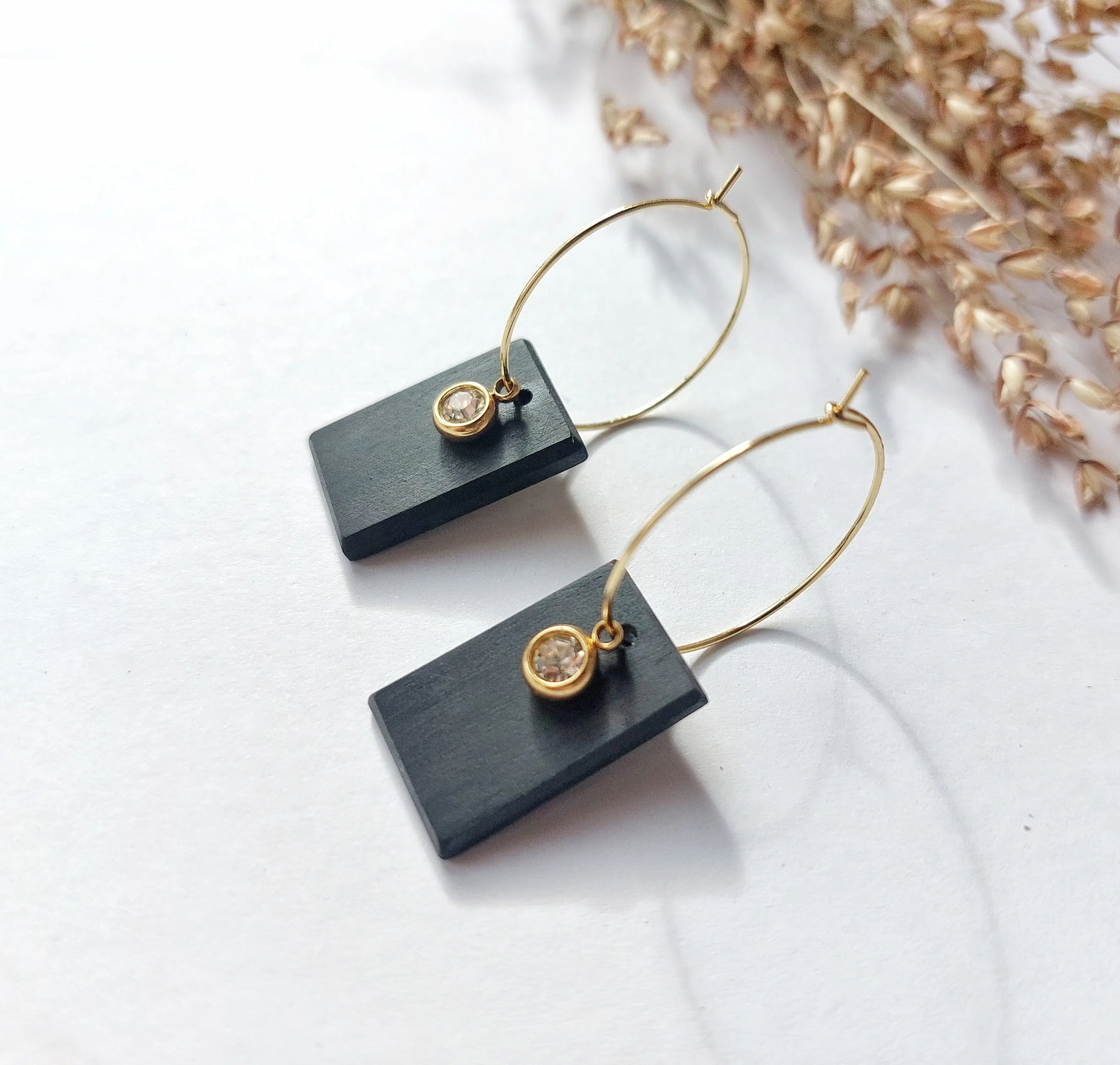 BOUCLES " EVIDENCE " en bois d'ébène et acier 316L