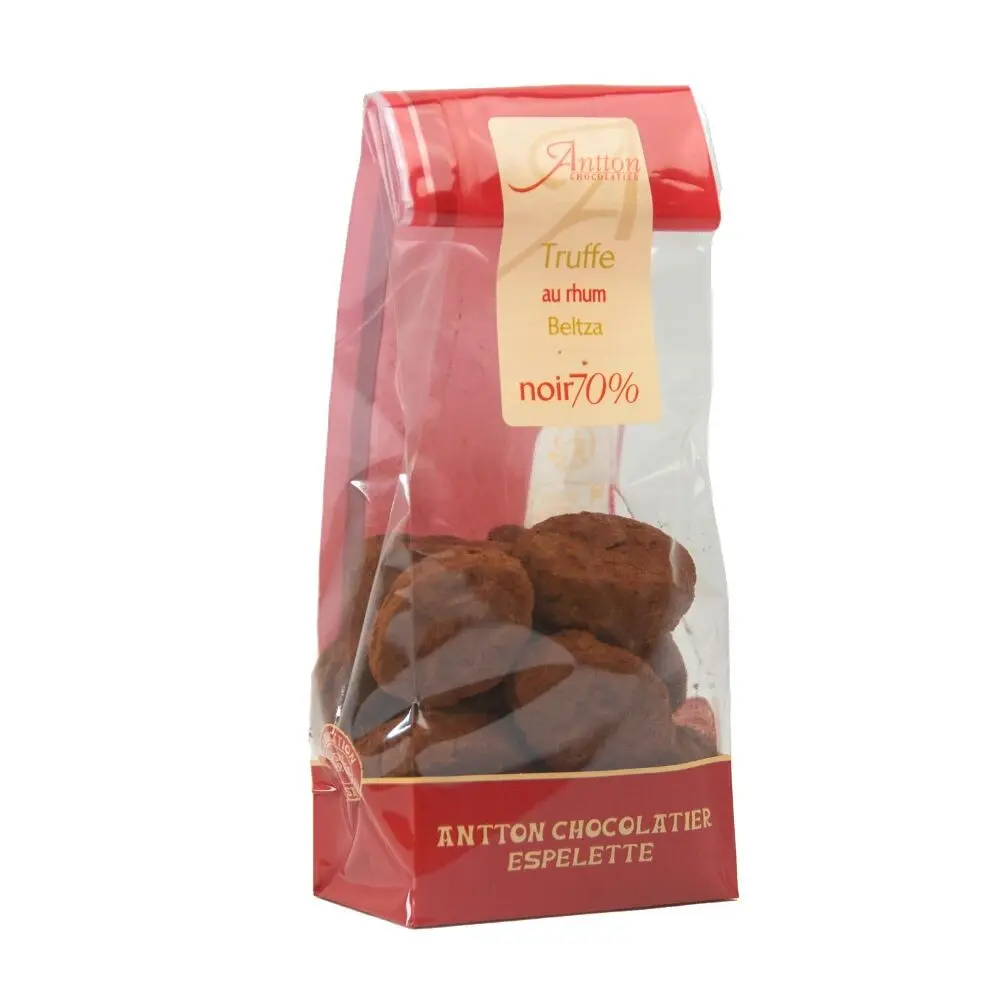 Pre-order available 03/11/26.Christmas, rum-flavored truffle pouch, dark chocolate 110g