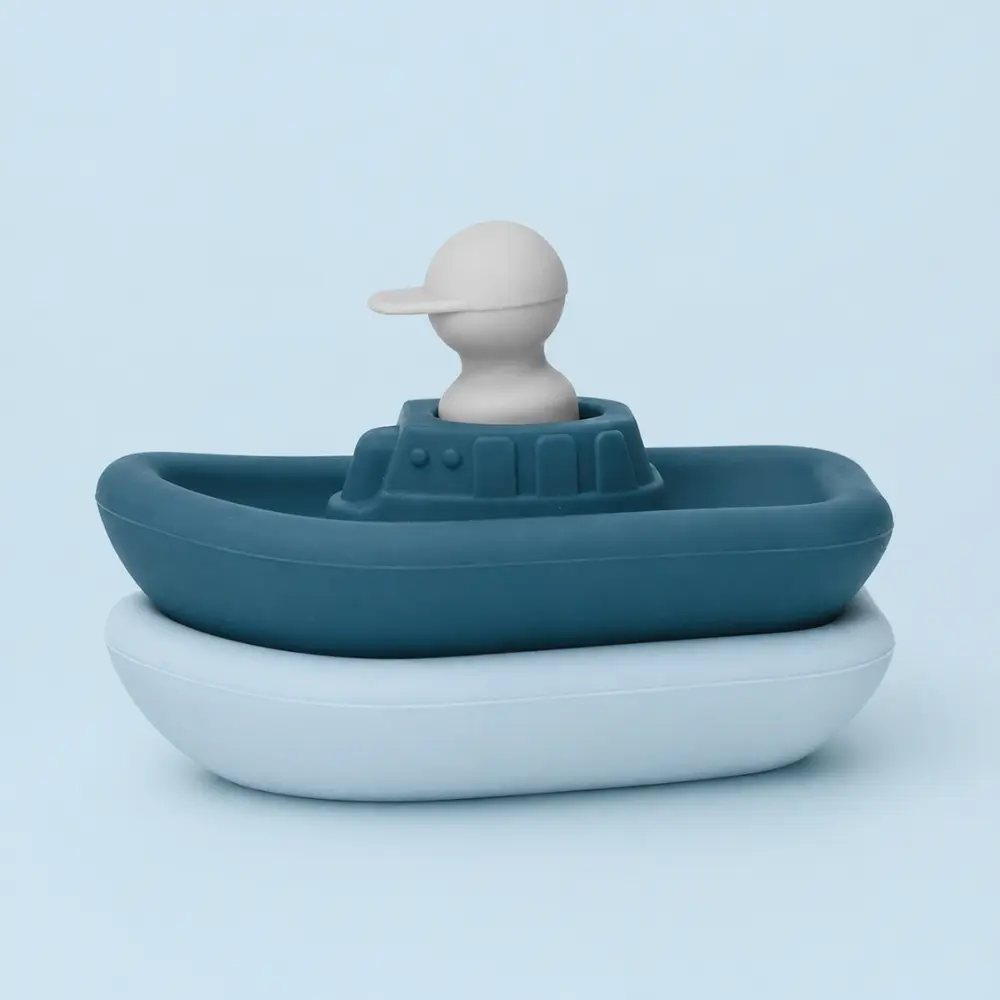 Jouet d'éveil pour le bain - Silicone, Bleu, set de 2 bateaux et 1 capitaine - Développe l'imagination