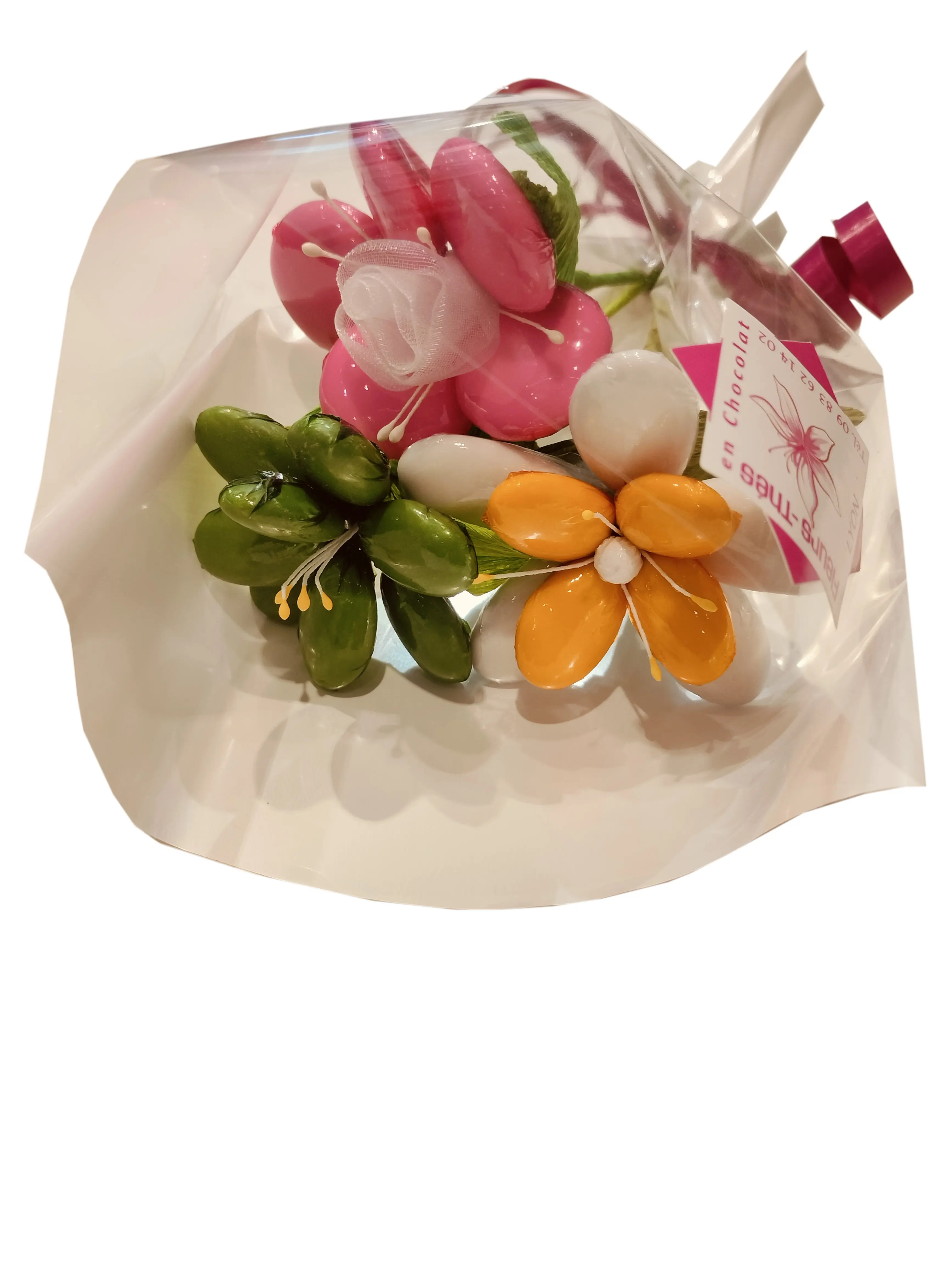 Mini bouquet of Freesia daisies and Tahiti Tiare flowers in chocolate dragees