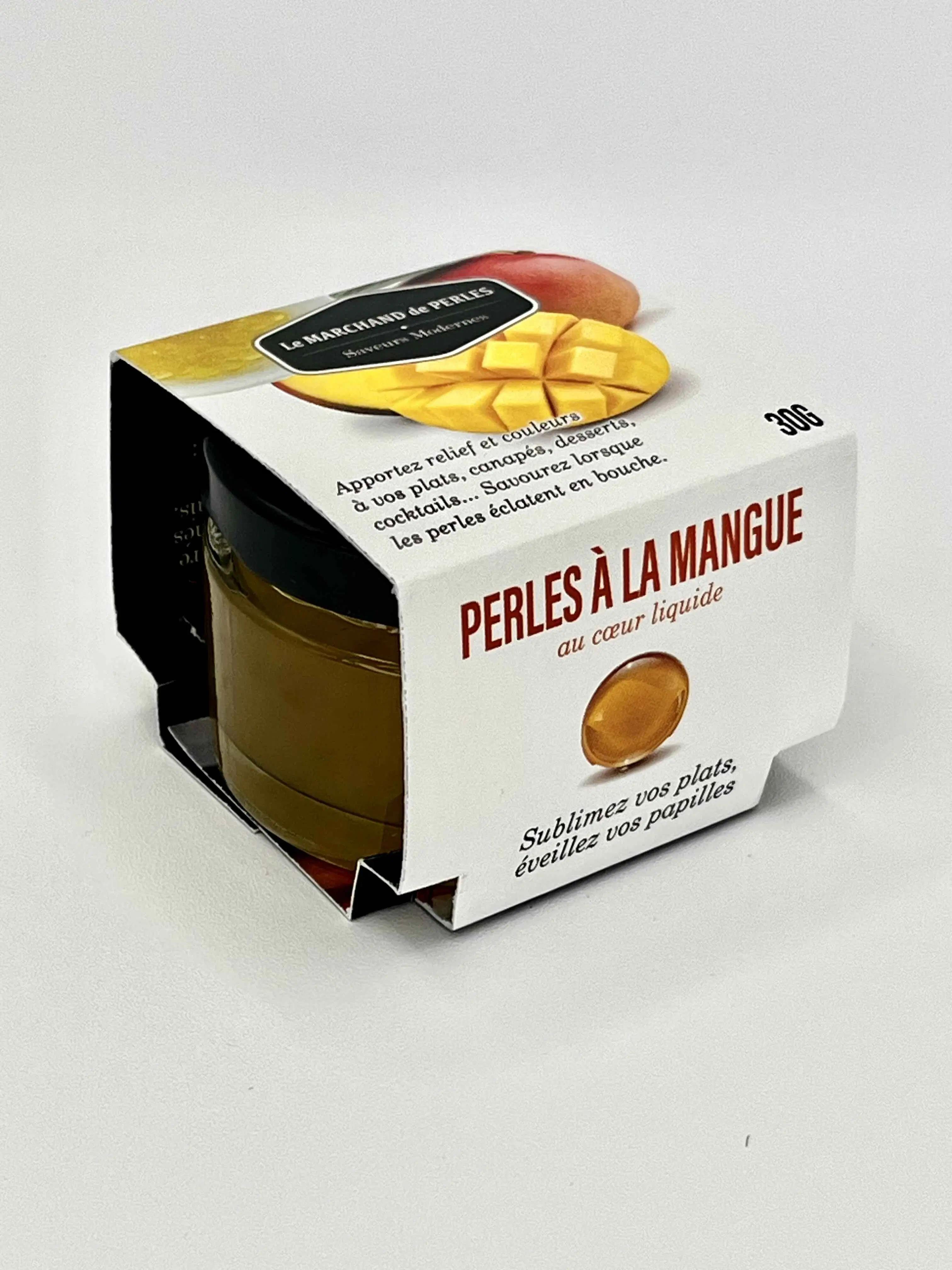 Perlas de mango con forma de corazón líquido - Molecular Cuisine