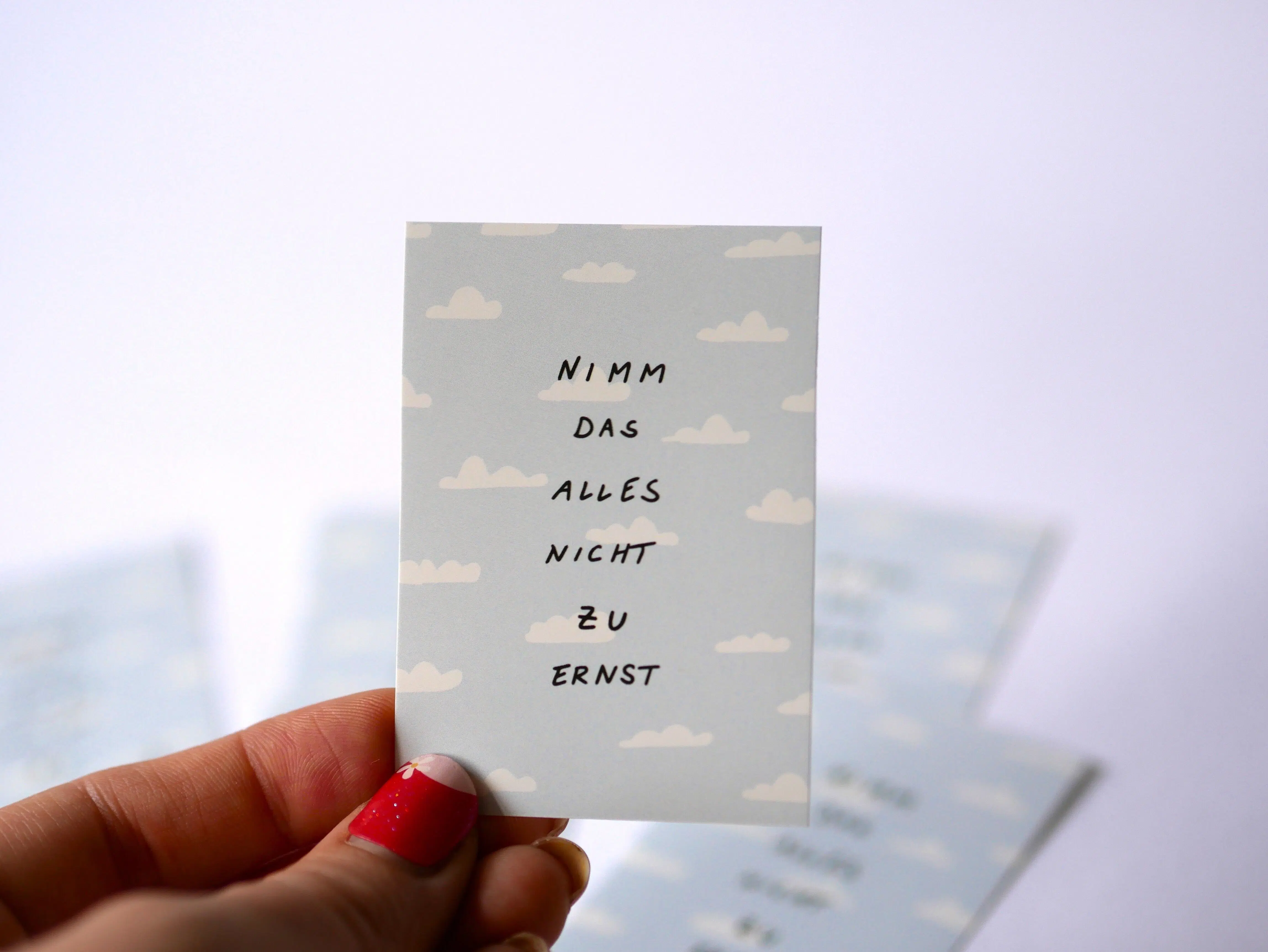 Outdoor cloud sticker "Don't take it all too seriously" – A8 vinyl sticker with cloud motif & scribble lettering, light blue, hand-painted, waterproof