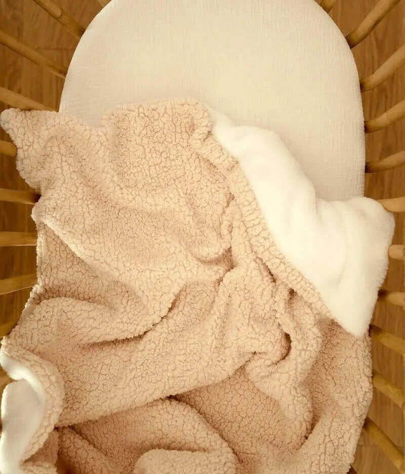 Ecru and fleece fluffy blanket