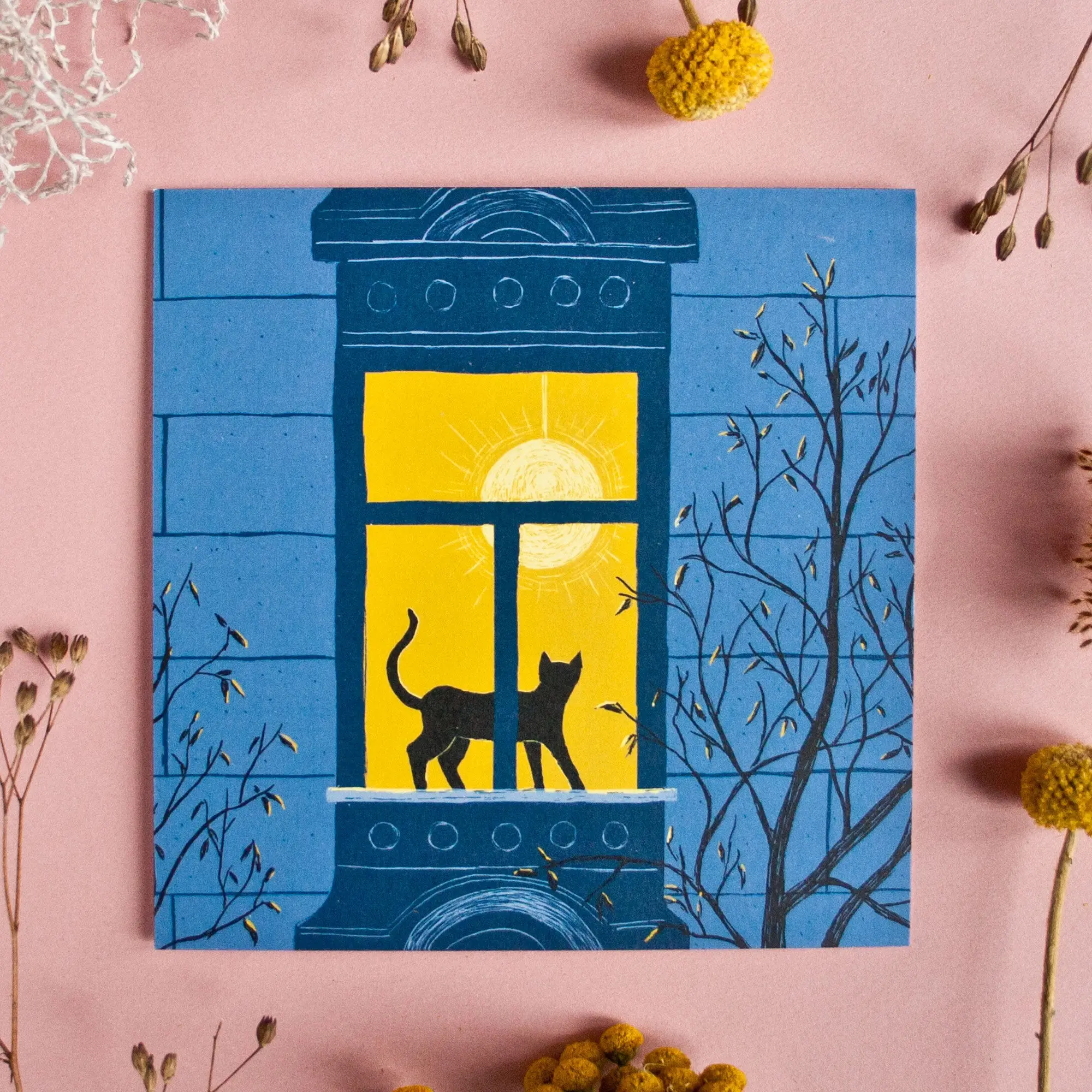 Carte postale carrée avec un chat dans la fenêtre