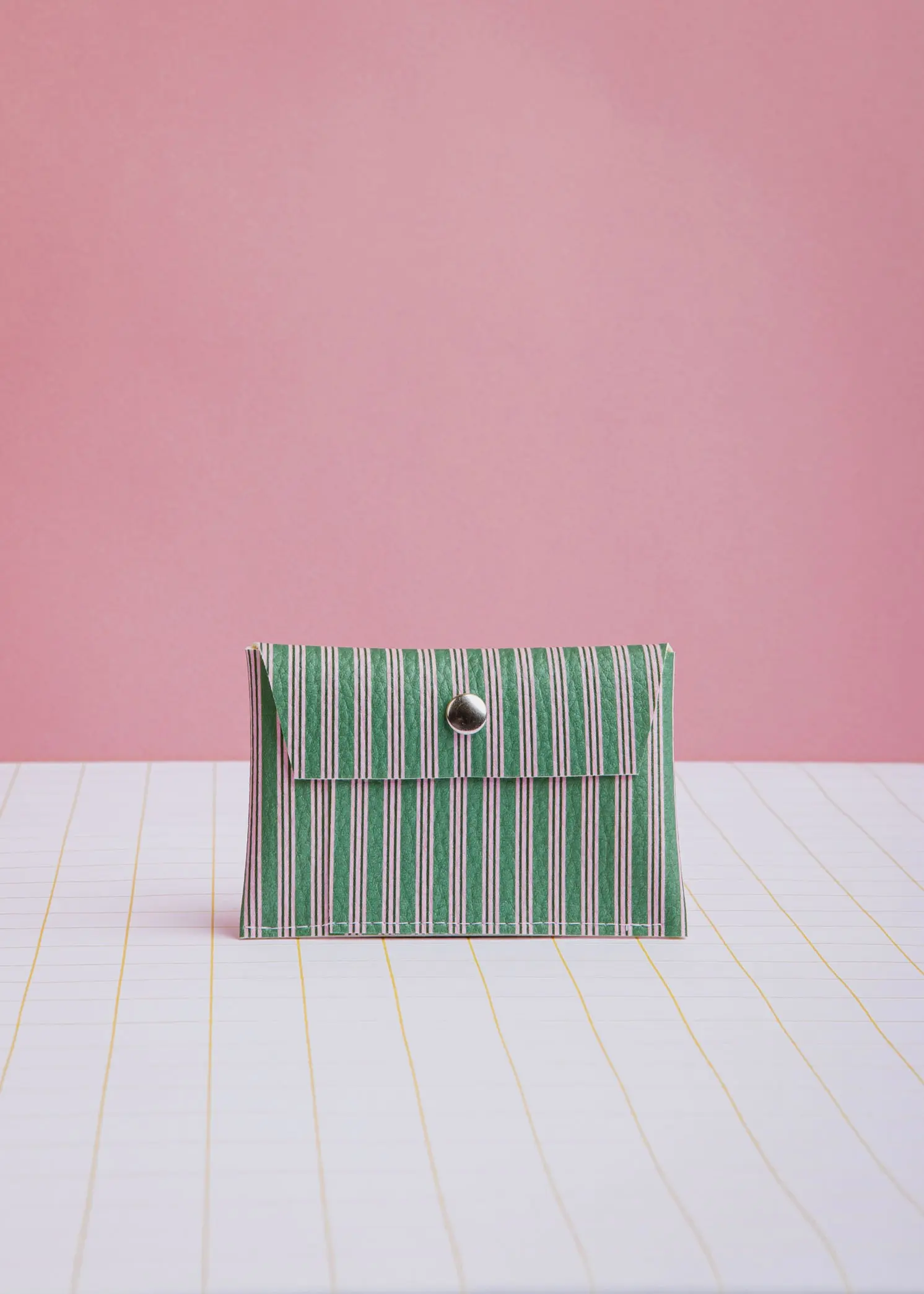 Green and pink striped card holder