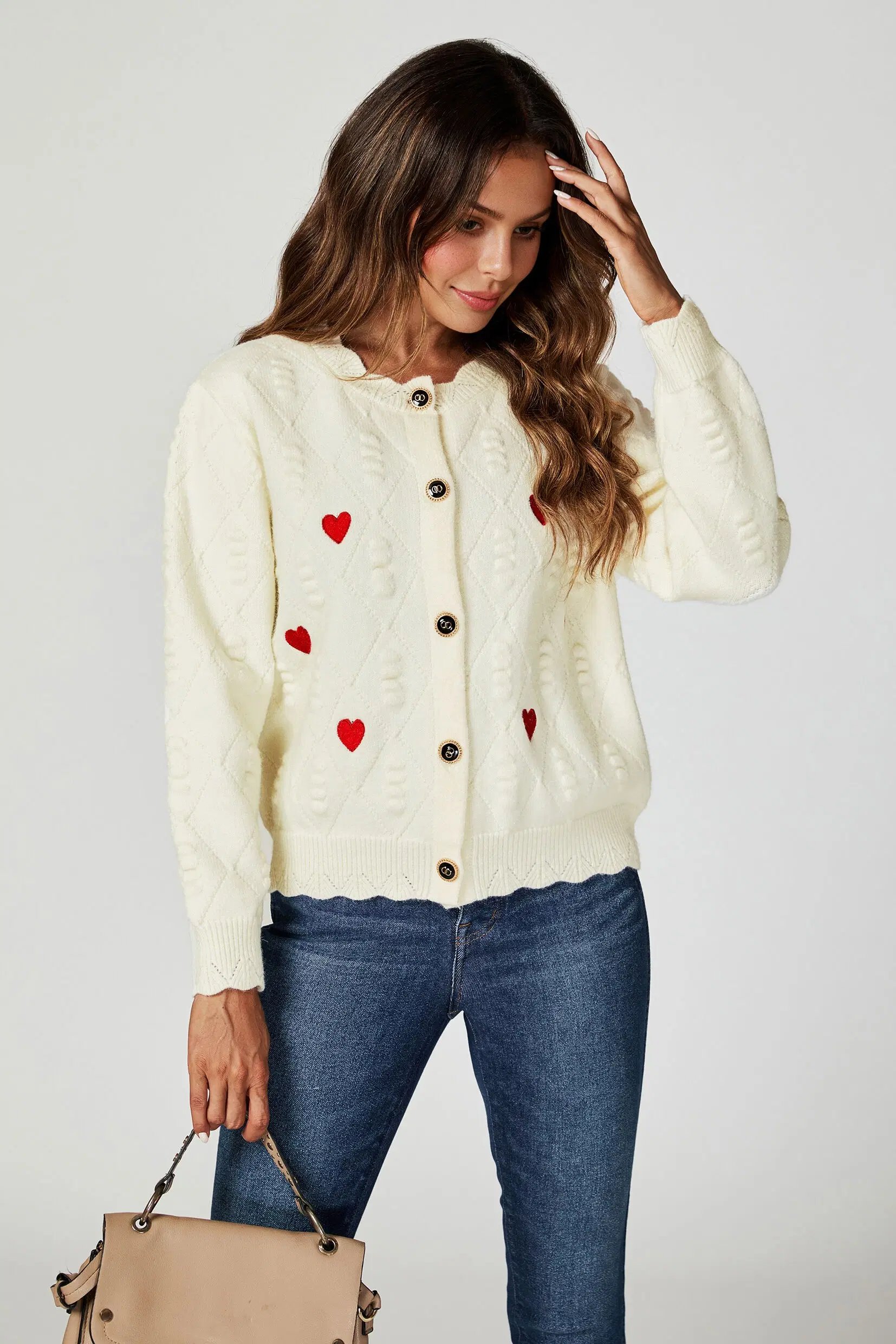 Cream-colored cardigan with heart embroidery