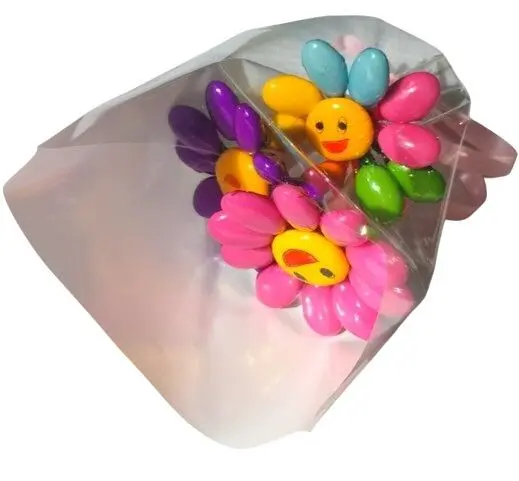 Mini bouquet of 3 smiley flowers, 2 solid colors and 1 multicolor in chocolate dragees