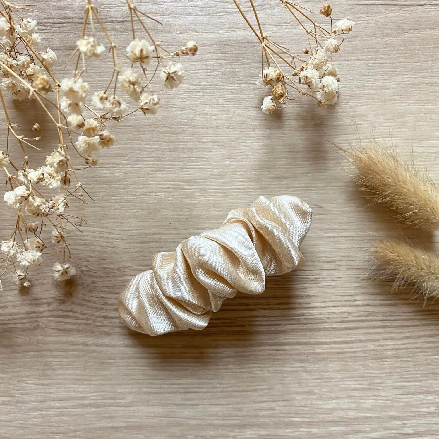 Champagne satin scrunchie hair clip from Margaux