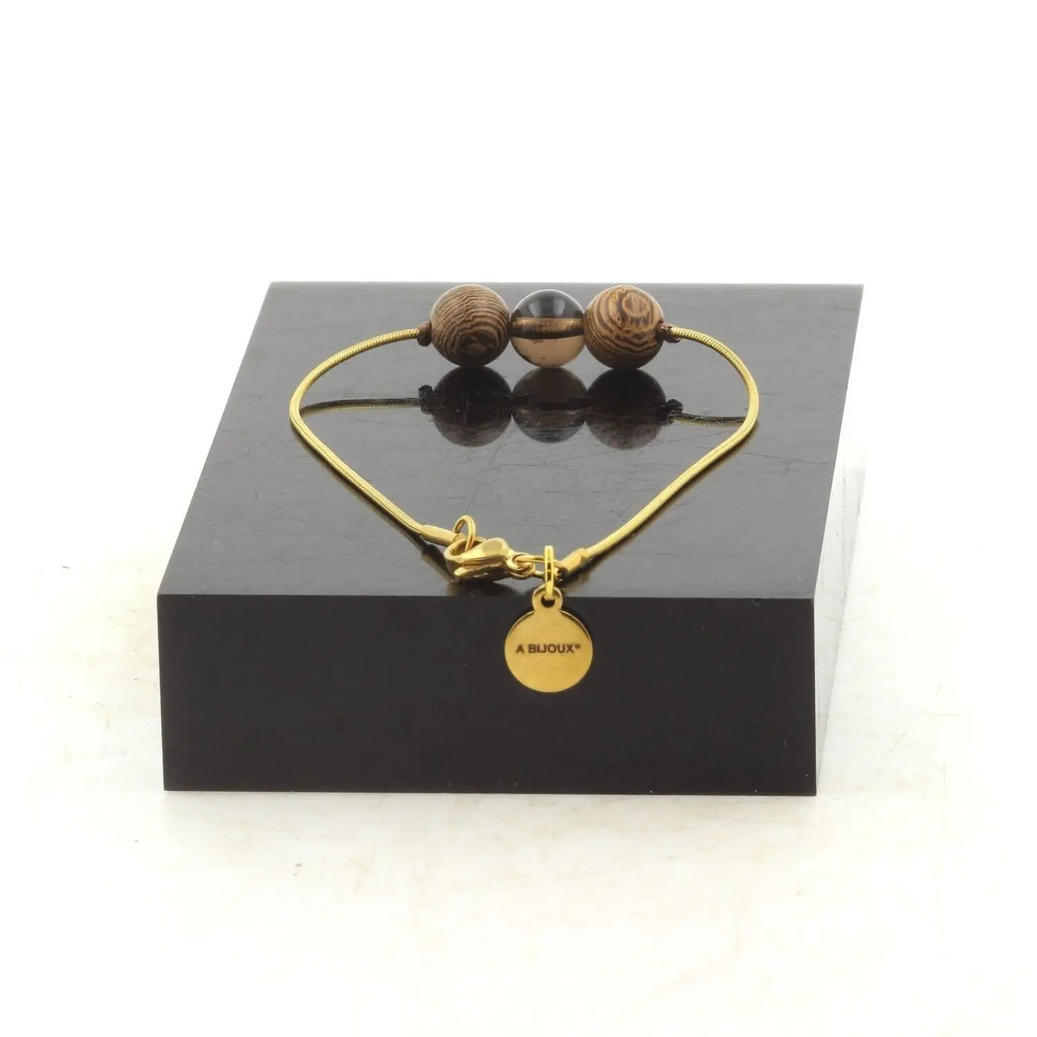 Pulsera de acero inoxidable bañada en oro con 1 perla de cuarzo brasileño ahumado + madera de 8mm. Fabricado en Francia