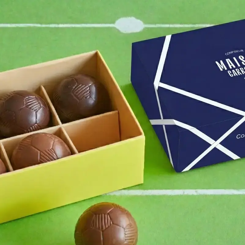 Fußbälle – mit Schokolade überzogene Marshmallows