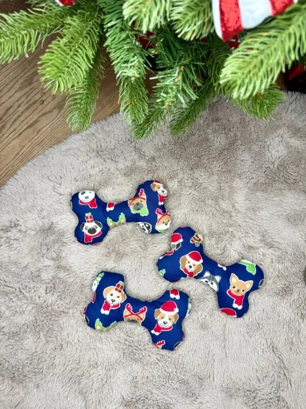Christmas dog toy in the shape of a bone, squeaky