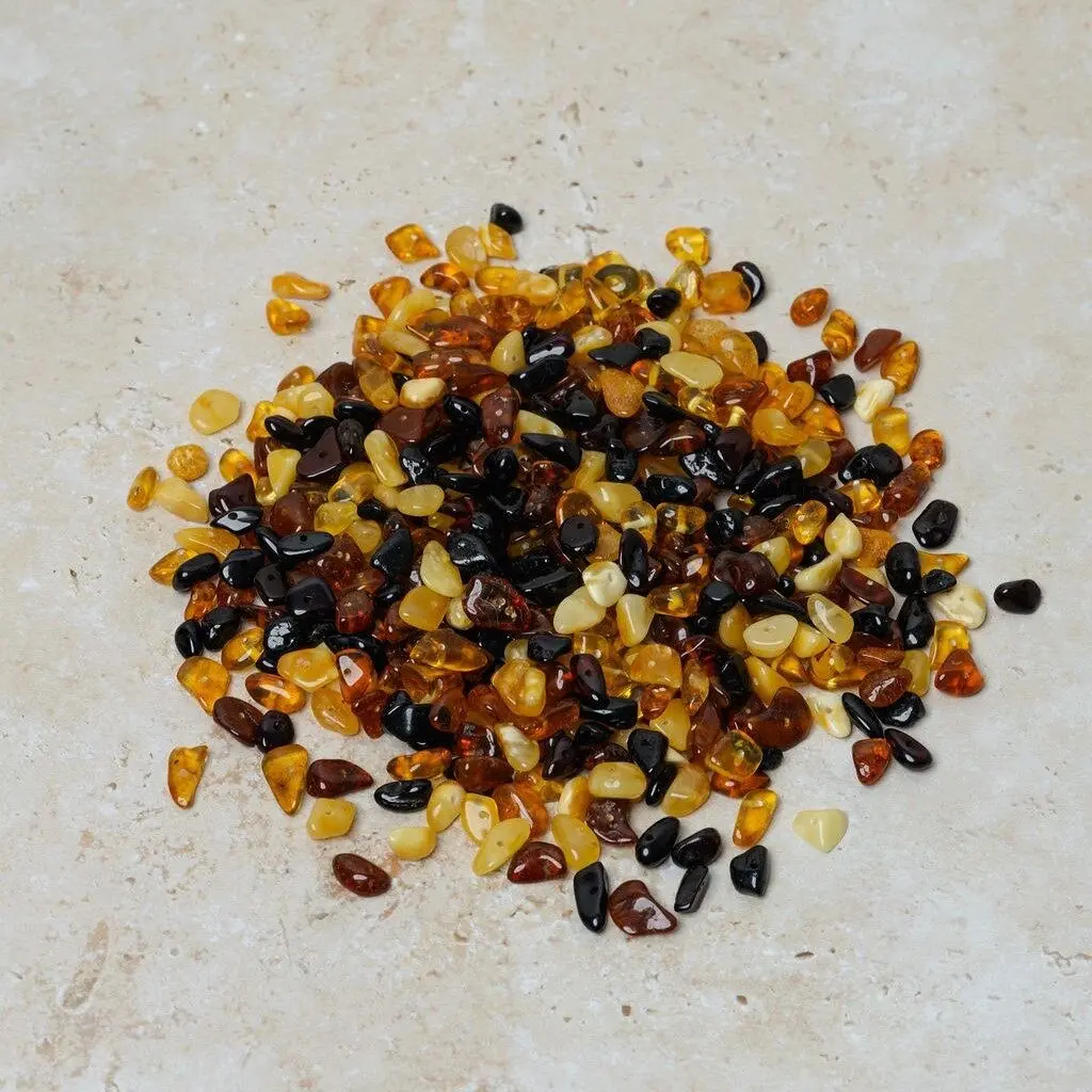 Drilled amber beads chips multicolor 50 gr (~600 pc)