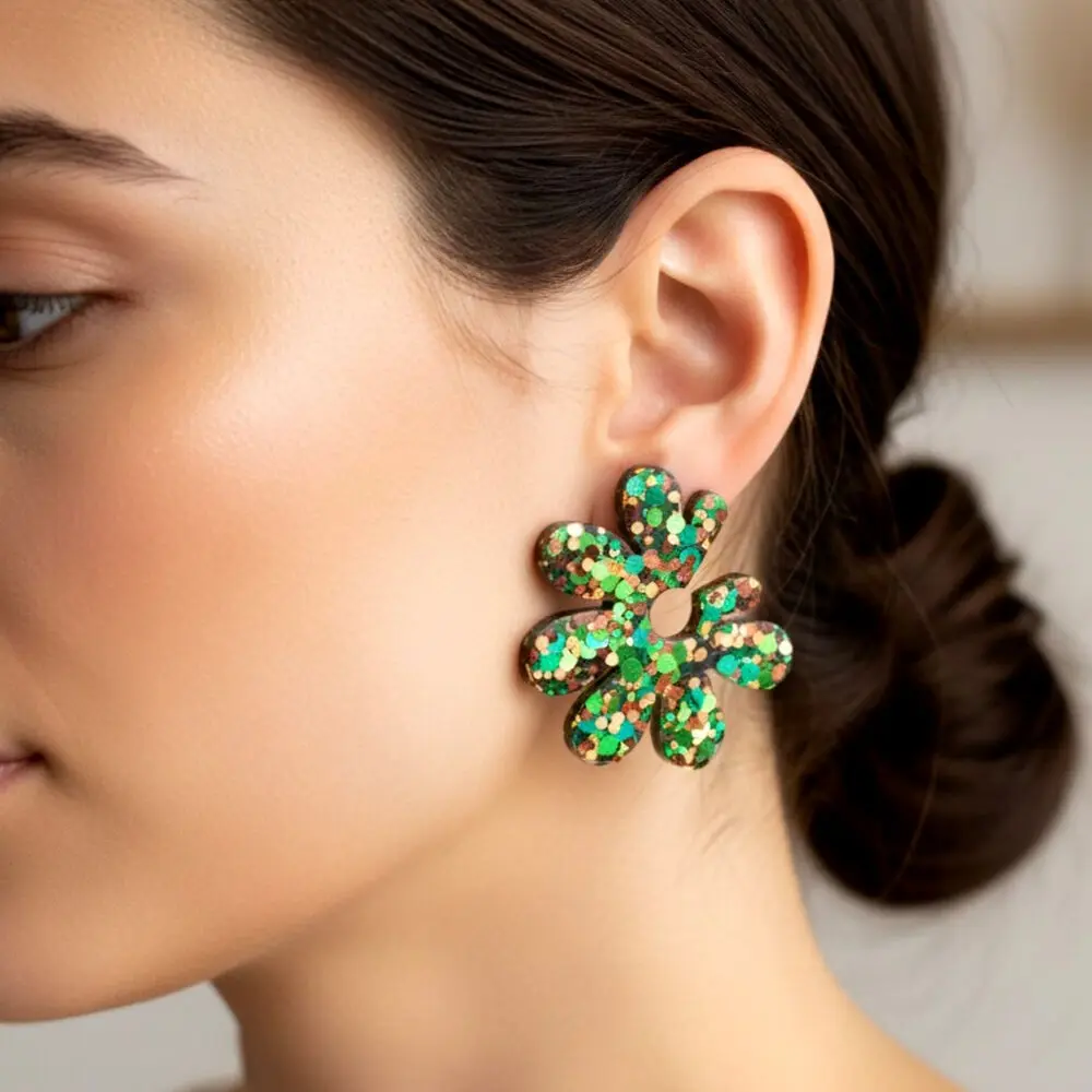 Resin flower earrings with green glitter