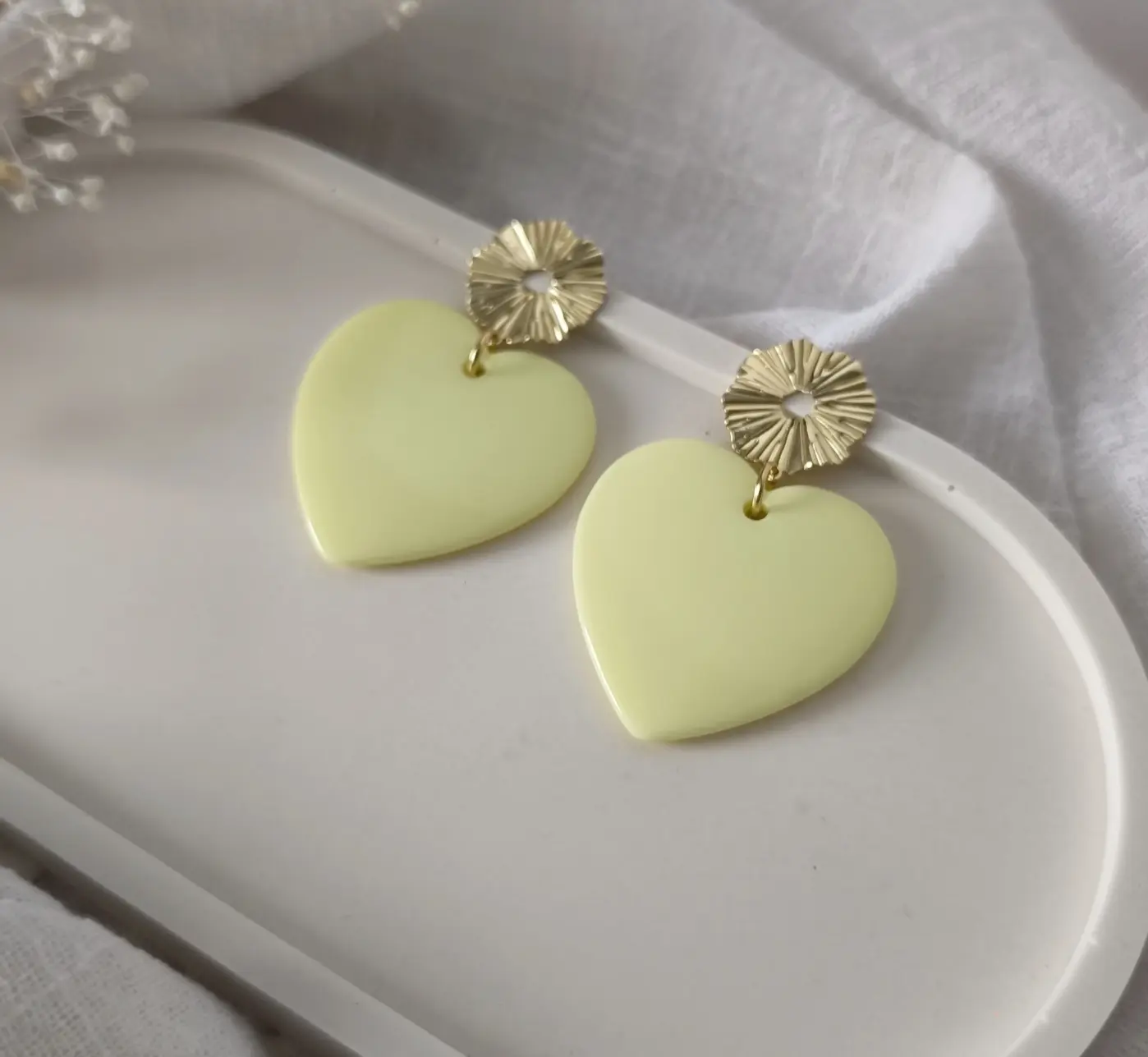 Pastel yellow heart earrings