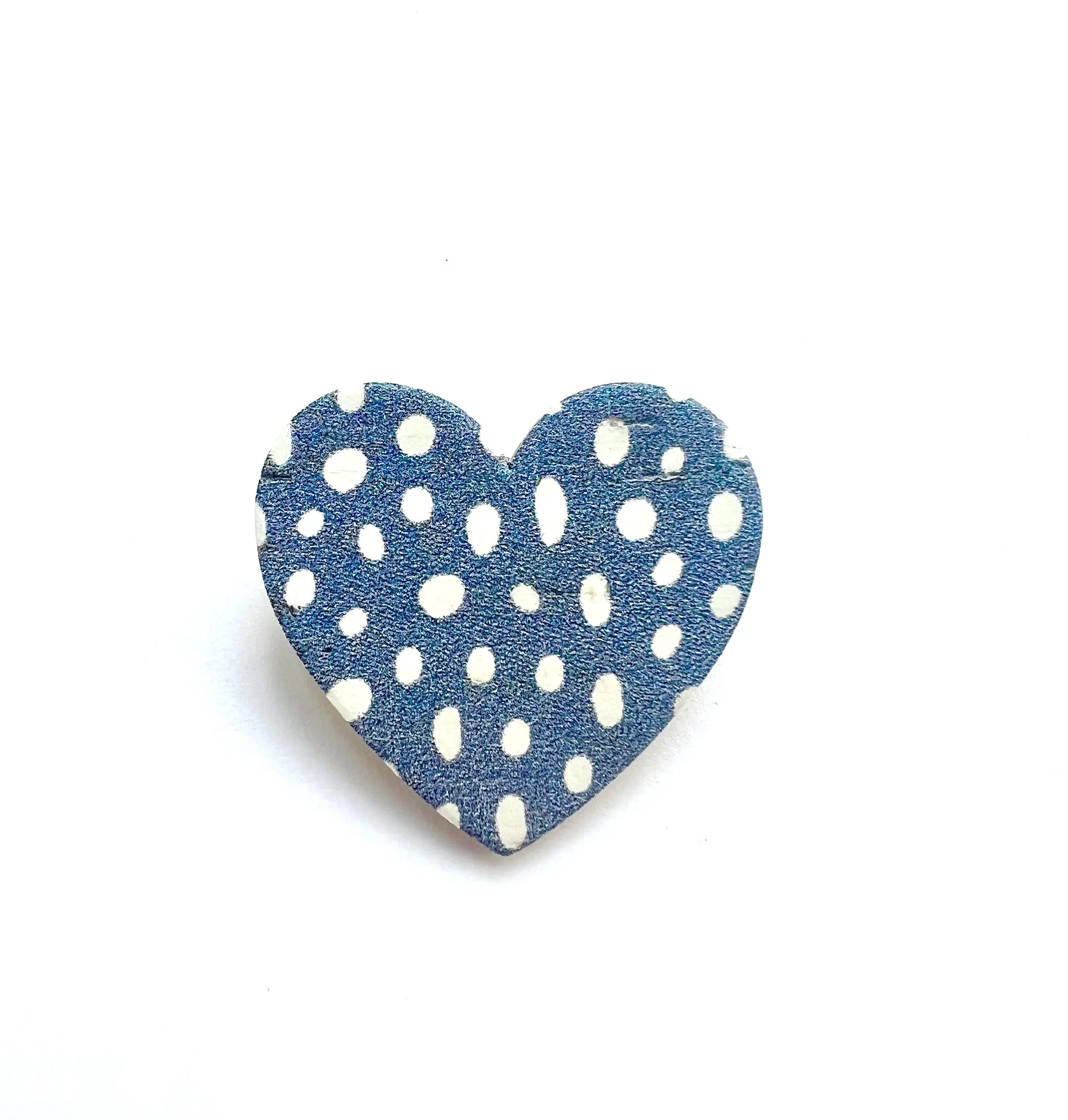 Heart brooch in cork and leather with white polka dots on a lavender background