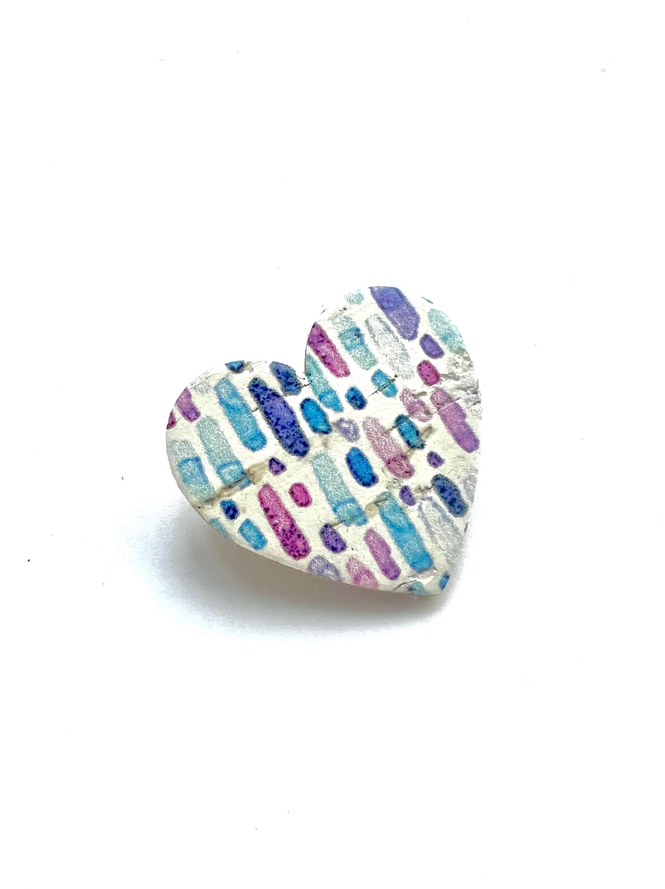 Heart brooch in cork and leather with a purple and blue graphic pattern