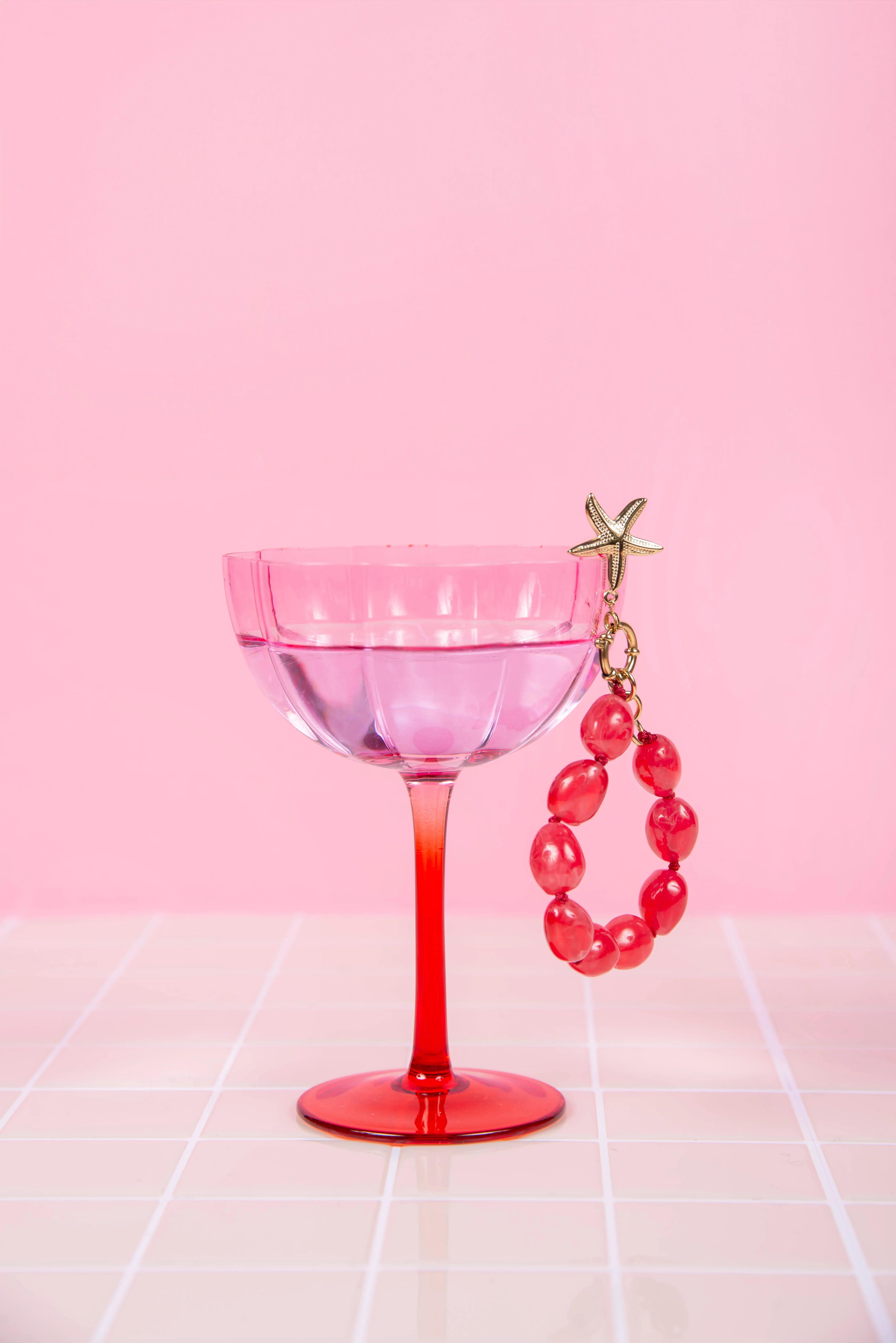 Pink resin bracelet - with starfish charms