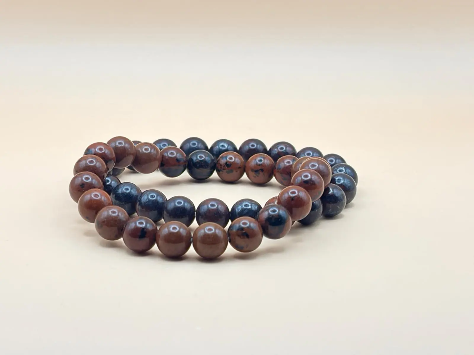 Round stone bracelet with iron eye
