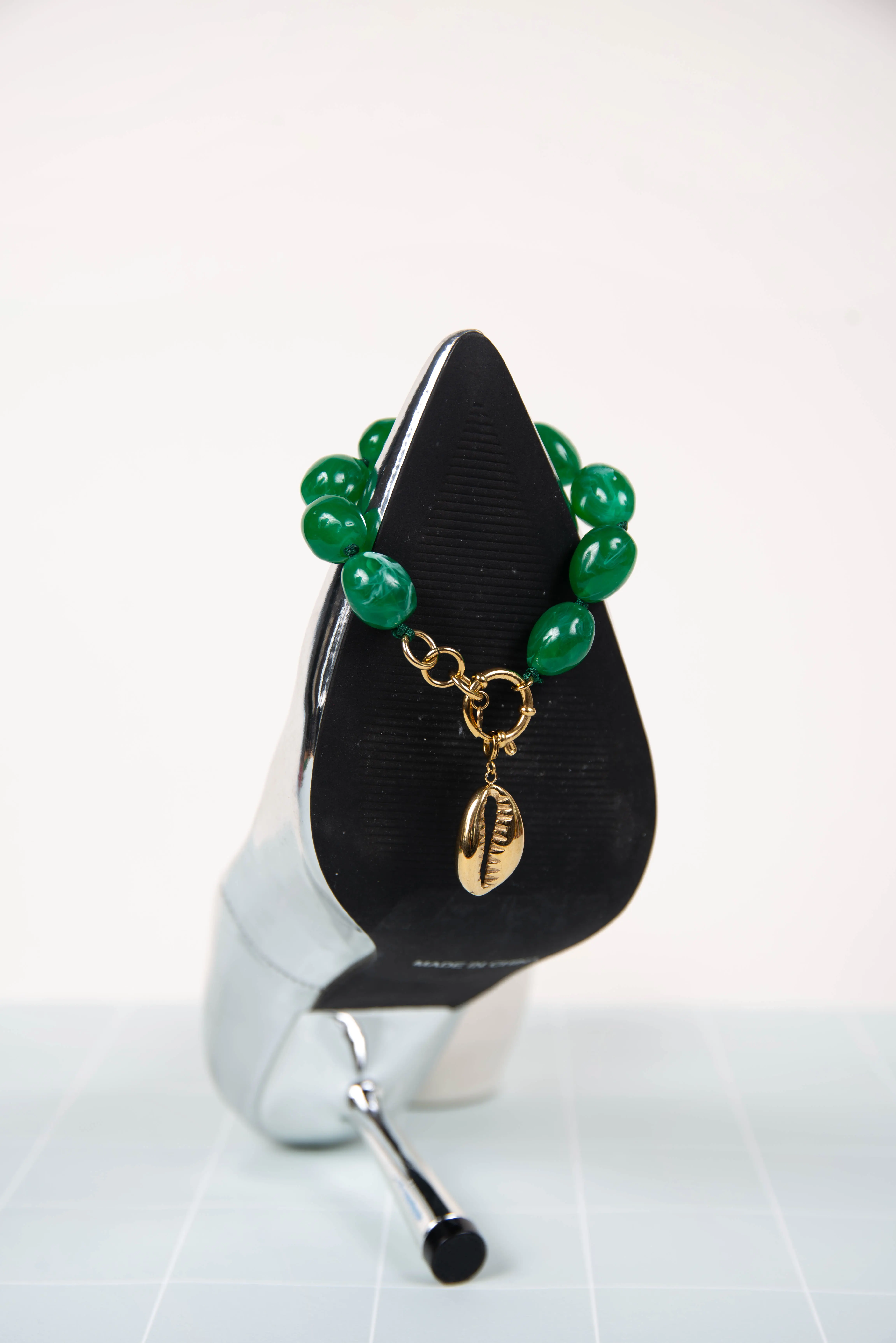 Green resin bracelet - with seashell charms