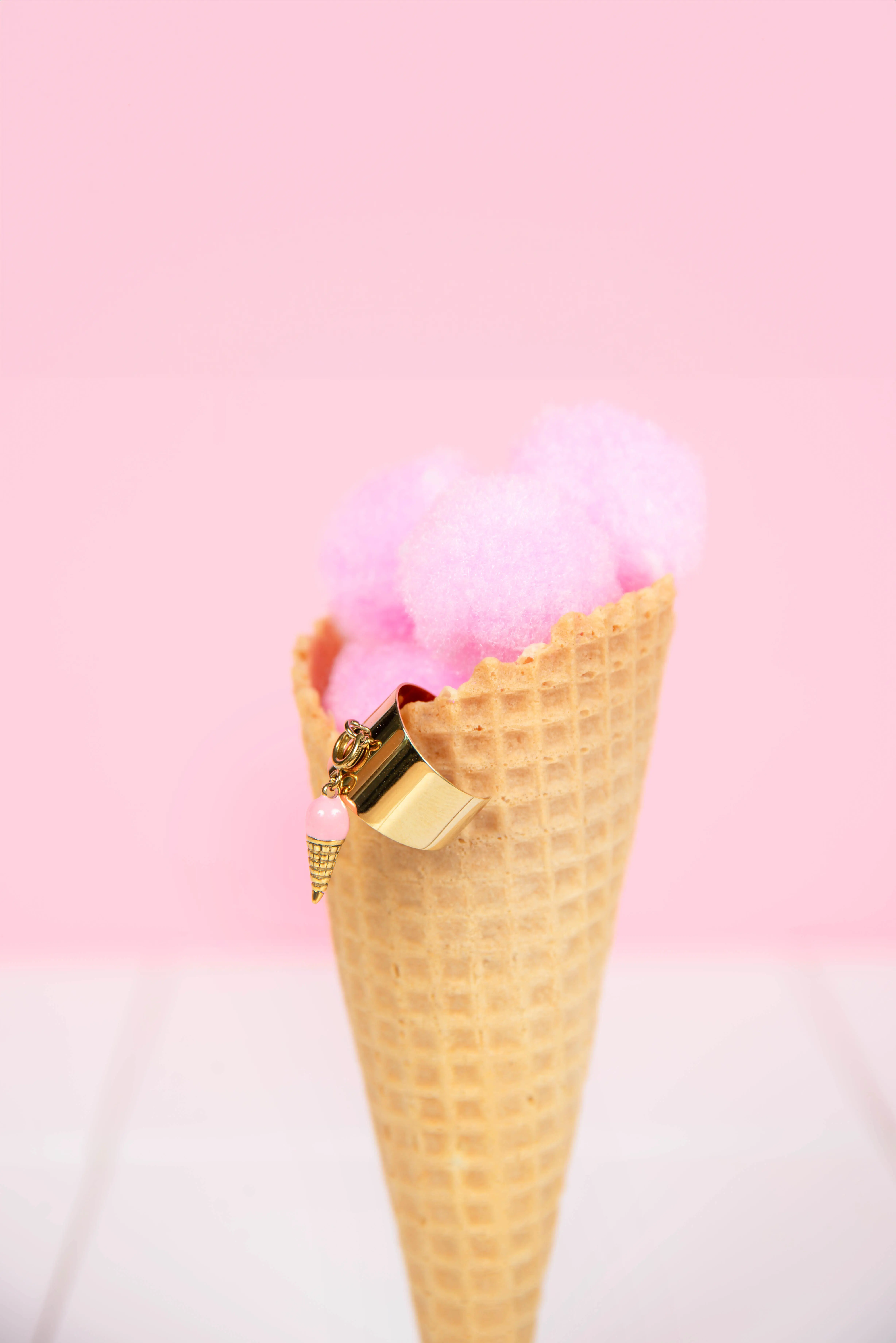 Adjustable stainless steel ring with ice cream cone charm