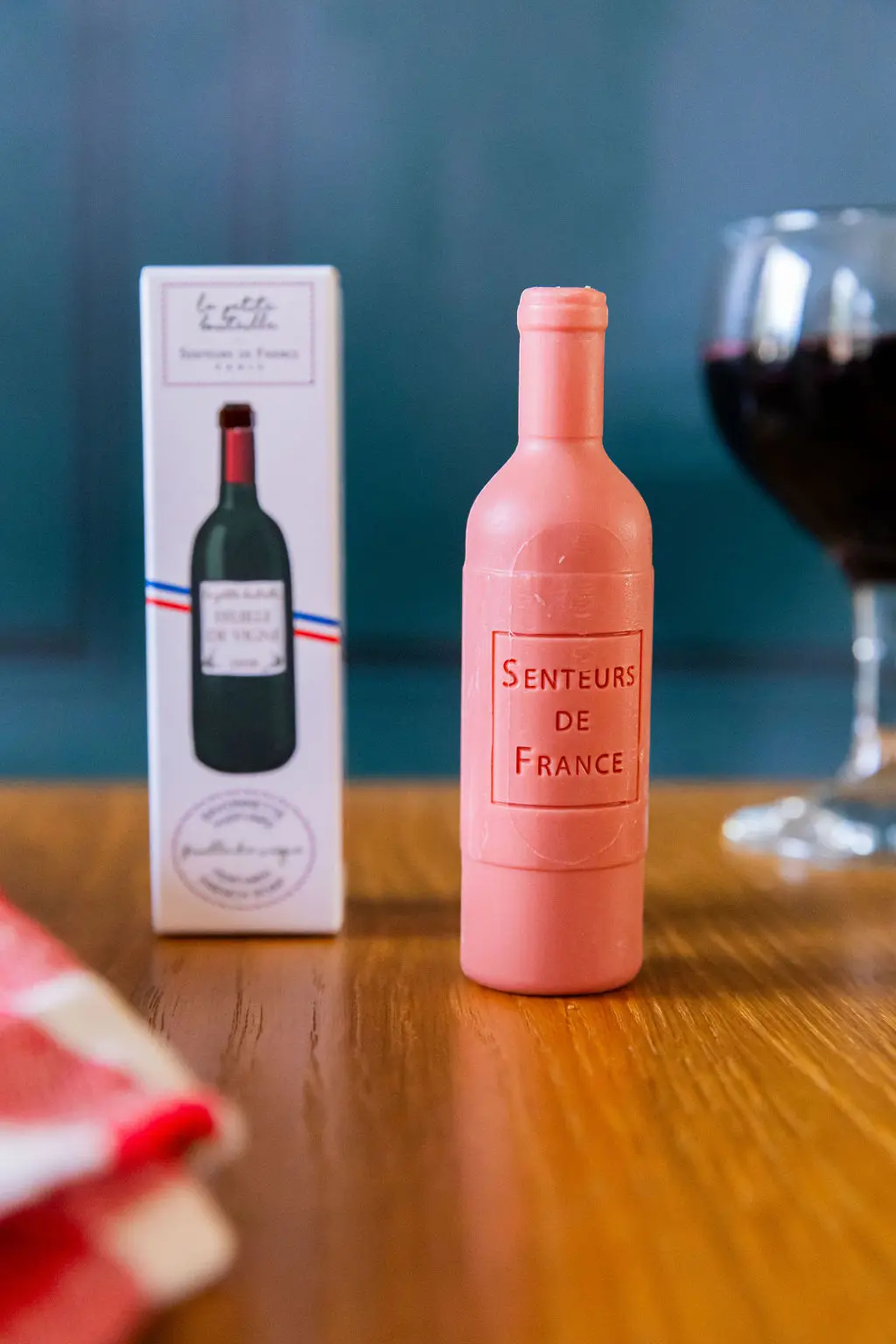 1 carton of "wine bottle" soap (54 units) + free display stand and 5% discount