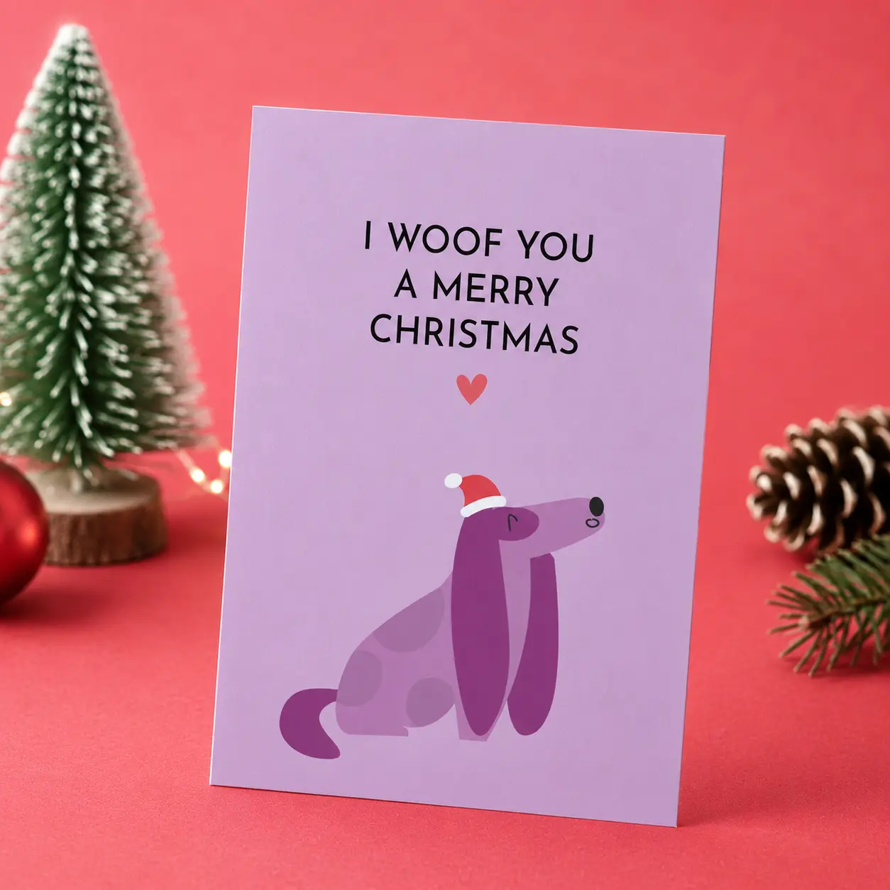 lustige Weihnachtskarte mit Hund „I Woof You a Merry Christmas“
