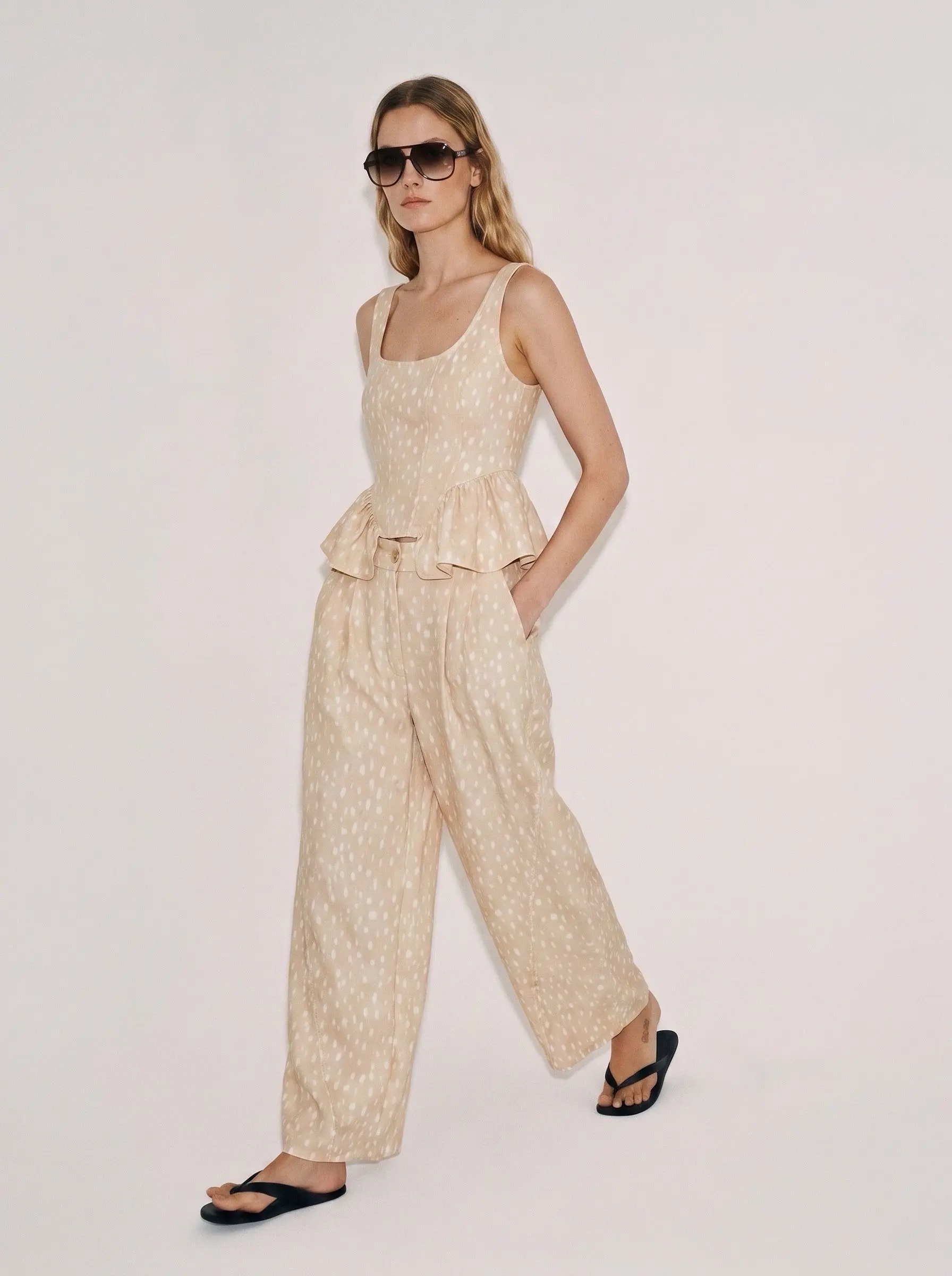 Ensemble top à basque et pantalon large à motif